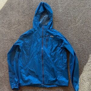Outdoor Research Vibrant Blue rain jacket